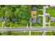 Aerial view of neighborhood with house, trees, street, and grass at 623 Hamilton E Holmes Nw Dr, Atlanta, GA 30318