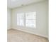 Bright bedroom with neutral carpet and natural light at 623 Hamilton E Holmes Nw Dr, Atlanta, GA 30318