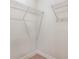 Corner of a closet with base trim and white wire shelving at 623 Hamilton E Holmes Nw Dr, Atlanta, GA 30318