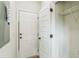 Bright entryway with white door with black hardware and a view of a closet at 623 Hamilton E Holmes Nw Dr, Atlanta, GA 30318