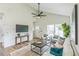 Cozy living room featuring vaulted ceiling, lots of natural light, comfortable seating, and tasteful décor at 623 Hamilton E Holmes Nw Dr, Atlanta, GA 30318