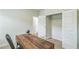 Bright home office space with neutral carpet, natural light, closet, and modern desk at 623 Hamilton E Holmes Nw Dr, Atlanta, GA 30318