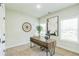 Bright home office space with neutral carpet, natural light, and modern decor at 623 Hamilton E Holmes Nw Dr, Atlanta, GA 30318