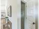 Hallway with a view of stainless steel appliances and a pantry with wire shelving at 623 Hamilton E Holmes Nw Dr, Atlanta, GA 30318