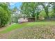 Overlooking view of the backyard and the exterior of the home at 629 Hickory Se Trl, Mableton, GA 30126