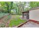 Backyard featuring a view of the house and covered screened-in porch at 629 Hickory Se Trl, Mableton, GA 30126