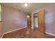 Bedroom showcasing wood floors and access to a closet at 629 Hickory Se Trl, Mableton, GA 30126