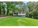 View of the home with a well-manicured lawn at 629 Hickory Se Trl, Mableton, GA 30126