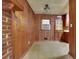 Kitchen and wood-paneled dining area with vintage features at 629 Hickory Se Trl, Mableton, GA 30126