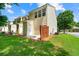 Townhome exterior features a fenced patio and grassy yard at 1343 Penhurst Dr, Lawrenceville, GA 30043