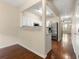 Kitchen featuring white cabinets and stainless steel appliances with breakfast bar seating at 1343 Penhurst Dr, Lawrenceville, GA 30043