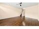 Spacious living room with hardwood floors, staircase, and ample natural light at 1343 Penhurst Dr, Lawrenceville, GA 30043