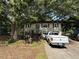 Charming two-story home with a cozy front yard and inviting curb appeal at 135 Woodcrest Dr, Covington, GA 30016