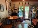 Cozy dining nook with table and accents located off the kitchen at 135 Woodcrest Dr, Covington, GA 30016