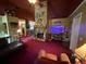 Spacious living area featuring a stone fireplace and ample seating at 135 Woodcrest Dr, Covington, GA 30016