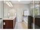Beautiful bathroom boasts double sinks, a soaking tub with decorative tile at 7275 Highland Blf # 8, Atlanta, GA 30328