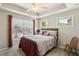 Bright bedroom with a tray ceiling, and large windows for natural light at 7275 Highland Blf # 8, Atlanta, GA 30328