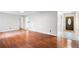 Spacious living room showcasing wood flooring and an entry door, offering a welcoming atmosphere at 1181 Mannbrook Dr, Stone Mountain, GA 30083