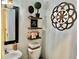 Stylish bathroom features decorative shelves and modern fixtures at 2706 Cedar Dr, Lawrenceville, GA 30043