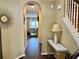Inviting hallway with hardwood floors, leading to a bright and stylish living area at 2706 Cedar Dr, Lawrenceville, GA 30043