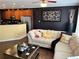 Inviting living room featuring stylish decor, wood floors, and a comfortable sofa at 2706 Cedar Dr, Lawrenceville, GA 30043