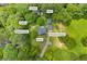 Aerial view of the Loganville, GA property showing the home, detached garage, shed, gazebo, raised garden and carport at 3100 Meadow Trl, Loganville, GA 30052