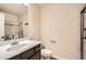 Modern bathroom featuring a vanity, mirror, and tiled shower at 3280 Hallmark Ln, Buford, GA 30519