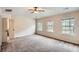 Bright bedroom with ample natural light and neutral carpet at 3280 Hallmark Ln, Buford, GA 30519