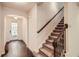 Inviting entryway with hardwood floors and staircase leading to the upper level at 3280 Hallmark Ln, Buford, GA 30519
