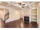 Spacious living room featuring hardwood floors, fireplace, and coffered ceilings at 3280 Hallmark Ln, Buford, GA 30519