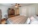 This bedroom has wood floors, neutral walls, double closets and ceiling fan at 5609 Twin Oak Dr, Douglasville, GA 30135