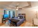 Bedroom with high ceilings, ceiling fan and lots of natural light at 5609 Twin Oak Dr, Douglasville, GA 30135