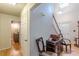 Welcoming foyer features hardwood floors, staircase, and natural light from front door at 5609 Twin Oak Dr, Douglasville, GA 30135