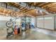 Unfinished garage with exposed duct work and overhead storage at 5609 Twin Oak Dr, Douglasville, GA 30135