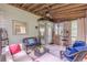 Charming screened porch with wicker furniture, a ceiling fan, and tile flooring at 5609 Twin Oak Dr, Douglasville, GA 30135
