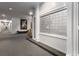 Well-lit building hallway featuring mailboxes, neutral color scheme and carpet flooring at 1421 Peachtree Ne St # 401, Atlanta, GA 30309