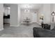 Open-concept living space with dining area, sofa and modern fixtures at 1421 Peachtree Ne St # 401, Atlanta, GA 30309