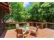 Outdoor back deck with string lights, providing an enchanting space for relaxation and entertaining at 1734 8Th St, Brookhaven, GA 30341