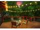 Evening back deck with string lights, providing an enchanting space for relaxation and entertaining at 1734 8Th St, Brookhaven, GA 30341