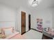 Cozy bedroom with hardwood floors, plush rug, and comfortable seating area at 1734 8Th St, Brookhaven, GA 30341