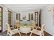 Bright and airy sunroom with elegant furniture, wood floors, and decorative lighting at 1734 8Th St, Brookhaven, GA 30341
