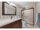 Bathroom featuring a sleek glass-enclosed shower, vanity, and a modern design at 1800 Clairmont #428 Lk # A428, Decatur, GA 30033