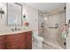 Bathroom featuring a glass shower, and wood-look vanity at 1800 Clairmont #428 Lk # A428, Decatur, GA 30033
