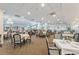 Elegantly decorated dining room with seating for many guests, chandeliers and carpet flooring at 1800 Clairmont #428 Lk # A428, Decatur, GA 30033