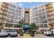 Well-maintained condominium building with mature landscaping, covered entrance and ample parking at 1800 Clairmont #428 Lk # A428, Decatur, GA 30033