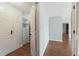 Hallway with hardwood floors and walk-in closet with custom storage at 1800 Clairmont #428 Lk # A428, Decatur, GA 30033
