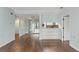 Open-concept living area boasts beautiful hardwood floors and soft blue walls throughout at 1800 Clairmont #428 Lk # A428, Decatur, GA 30033