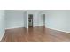 Open-concept living area boasts beautiful hardwood floors and soft blue walls throughout at 1800 Clairmont #428 Lk # A428, Decatur, GA 30033