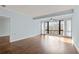 Inviting living room with hardwood floors, natural light, and scenic views from the large window at 1800 Clairmont #428 Lk # A428, Decatur, GA 30033