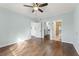 Spacious bedroom featuring hardwood floors, ceiling fan, and two large walk-in closets at 1800 Clairmont #428 Lk # A428, Decatur, GA 30033